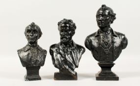 THREE BLACK METAL BUSTS. 6ins, 7ins and 8ins high.