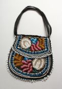 AN AMERICAN INDIAN BEAD WORK BAG.