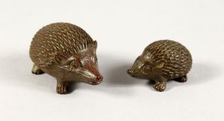 TWO MINIATURE JAPANESE BRONZE HEDGEHOGS.
