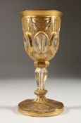 A BOHEMIAN GILDED GOBLET. 7.5ins high.
