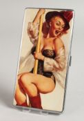 A METAL ENGINE TURNED CIGARETTE CASE, the top with a glamour model on a pole.