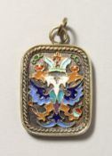 A RUSSIAN SILVER AND ENAMEL PENDANT.