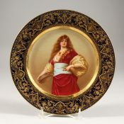 A GOOD VIENNA PORCELAIN PLATE, superb quality, painted with Tochter Kalifen. Beehive mark. 9.5ins
