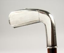 AN UNUSUAL AND RARE WALKING STICK, the handle as a golf club which opens as a cigarette case. 2ft