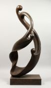 IN THE MANNER OF HENRY MOORE A GOOD ABSTRACT BRONZE FIGURE GROUP, on a rectangular base. 35ins