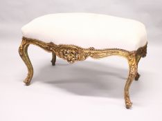 A LARGE GILTWOOD STOOL with padded top. 3ft 3ins long.