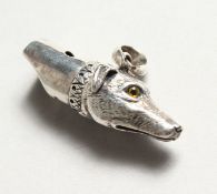 A SILVER HOUND WHISTLE.