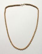 A 9CT GOLD ROPE NECKLACE. 6gms.