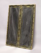 A PAIR OF EGLOMISE LONG MIRRORS with bamboo type frame. 3ft long x 1ft wide.