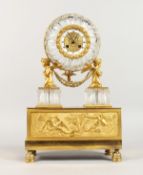 A SUPERB FRENCH EMPIRE CRYSTAL AND ORMOLU CLOCK, supported by a winged figure on a crystal and