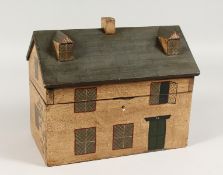 A PAINTED HOUSE TEA CADDY. 10ins wide.