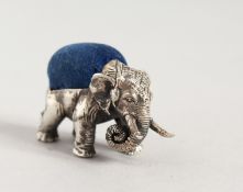 A SILVER ELEPHANT PIN CUSHION.