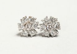 A VERY GOOD PAIR OF DIAMOND CLUSTER EARRINGS.