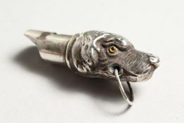 A SILVER DOG'S HEAD WHISTLE.