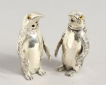 A PAIR OF .925 SILVER PLATE PENGUIN SALT AND PEPPERS. 2.25ins high.