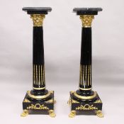 A VERY GOOD PAIR OF LARGE BLACK MARBLE AND ORMOLU COLUMNS with square tops. 4ft 5ins high.