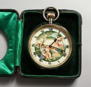 A LARGE 10CM DIAMETER POCKET WATCH, the face with erotic scene, in a leather case.