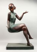 A GOOD LARGE UNUSUAL BRONZE FIGURE OF A SEATED WOMAN, holding a mirror in her hand, on a rectangular