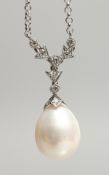 A MATCHING 18CT WHITE GOLD, PEARL AND DIAMOND DROP PENDANT on chain. Pearls: 11mm. Diamonds: 0.