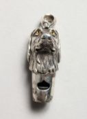 A SILVER DOG'S HEAD WHISTLE.
