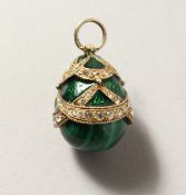 A RUSSIAN SILVER AND ENAMEL EGG.