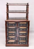 A VICTORIAN MAHOGANY CABINET, the top with two shelves over a base with five rows of leather fronted