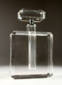 A LARGE CLEAR SCENT BOTTLE AND STOPPER.