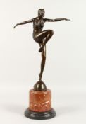 AFTER J. PHILIPP AN ART DECO BRONZE DANCING GIRL. Signed, on a marble base. 17ins high.
