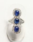 A SUPERB SAPPHIRE AND DIAMOND RING, three cabochon sapphires and diamond. Sapphires 3.6cts.