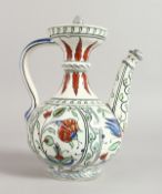 A GOOD OTTOMAN IZNIK STYLE EWER, white ground, panels of flowers and blue handles. 8.5ins high.