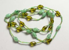 AN IRANIAN GREEN NECKLACE.