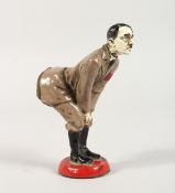 A PAINTED MODEL OF HITLER as a pin cushion. 4.5ins high.