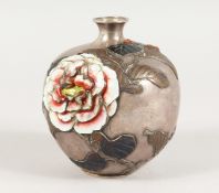A JAPANESQUE SILVER AND ENAMEL BULBOUS VASE decorated with flowers and leaves in relief.