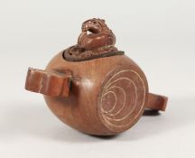 A JAPANESE CARVED WOOD TWO-HANDLED DRUM SHAPED BOX with carved horse. Signed.