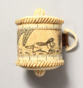 AN ETCHED BONE TAPE MEASURE. 1.25ins.