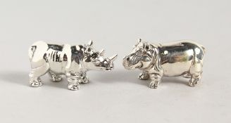 TWO MINIATURE CAST SILVER ELEPHANT AND RHINO.