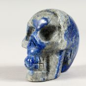A CARVED LAPIS SKULL. 3ins.