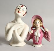 TWO POTTERY PIN DOLLIES.