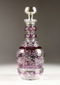 A SILVER TOP AMETHYST FRUITING VINE DECANTER AND STOPPER.