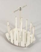 A CHRISTOPHER DRESSER DESIGN OVAL SHAPED TOAST RACK.