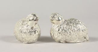A PAIR OF SILVER PLATE PARTRIDGE SALT AND PEPPERS.