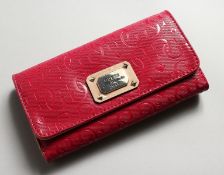 A NEW GUESS LOS ANGELES 1981 PURSE in a box.