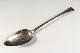 A GEORGE III SILVER BASTING SPOON. London 1813.