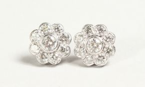 A VERY GOOD PAIR OF DIAMOND CLUSTER EARRINGS.