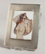 AN EDWARD VII ENGINE TURNED SILVER CIGARETTE CASE, the top with an enamel of a semi-nude. Birmingham