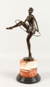 AFTER D. ALONZO AN ART DECO BRONZE HOOP GIRL. Signed, on a marble base. 14ins high.