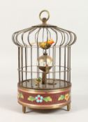 A BIRD CAGE CLOCK. 7.5ins high.