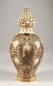 A GOOD ZSOLNAY PIERCED PORCELAIN VASE AND COVER of octagonal form. Mark FISCHER J. BUDAPEST. 16ins
