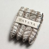 A SILVER HAVANA CIGAR VESTA.