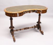 A VICTORIAN WALNUT KIDNEY SHAPED WRITING DESK, with inset green leather top, two small bowfronted